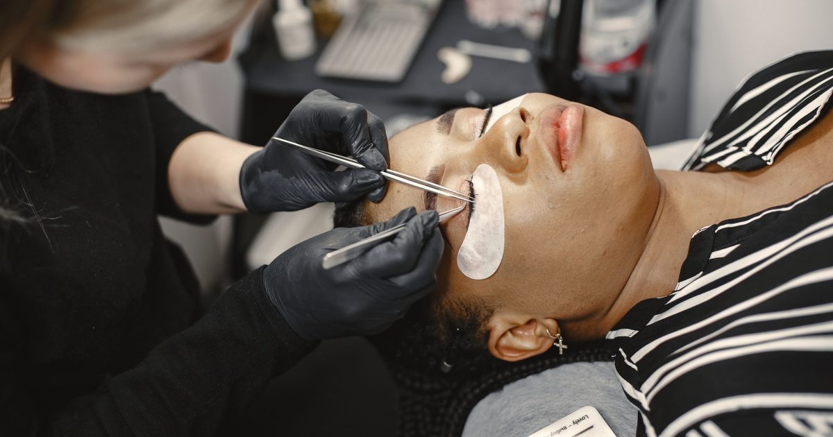 Lash technician working on a client - websites for beauty salons UK