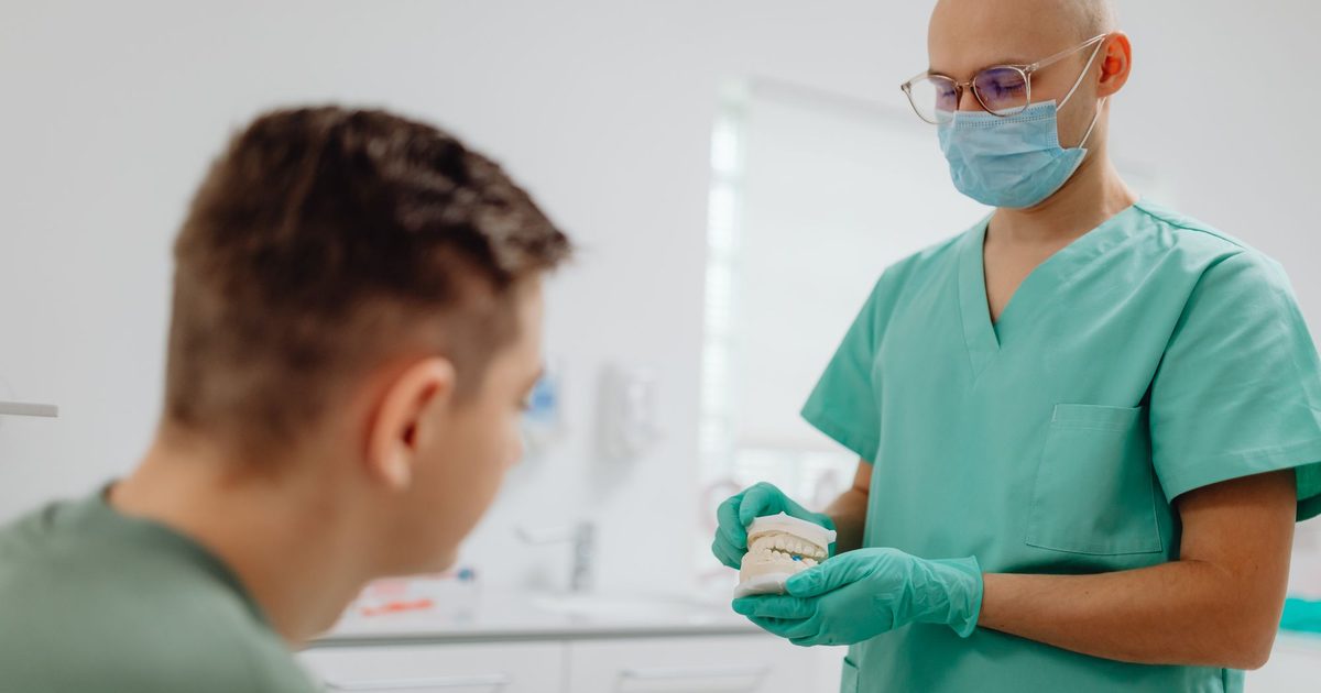 Dentist and patient in a modern UK dental surgery - dental practice websites UK